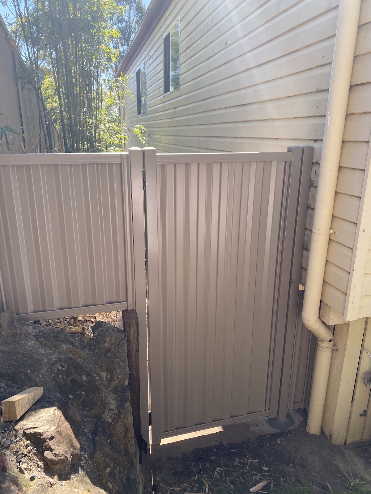 Beige Colorbond side gate and fence